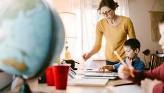 Adult working with child