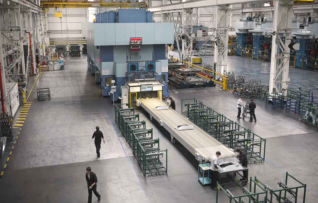 View of a factory floor area with workers.