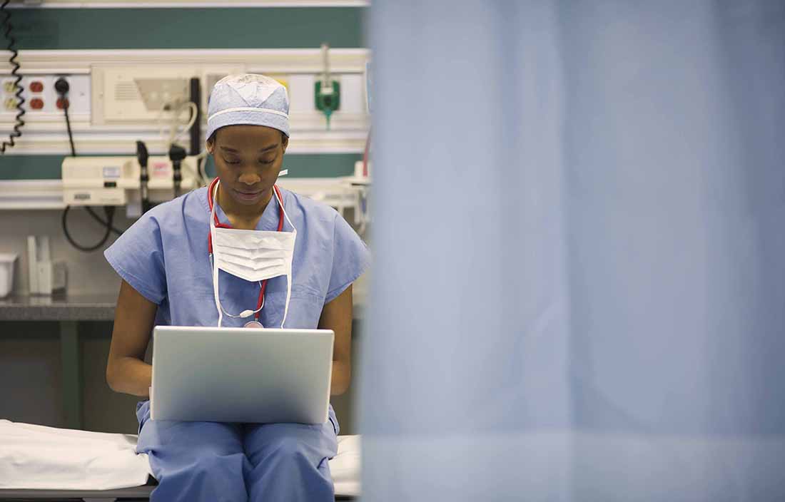Medical worker on laptop