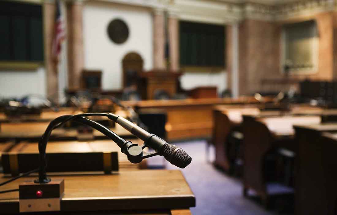 Close-up view of a podium and a microphone.