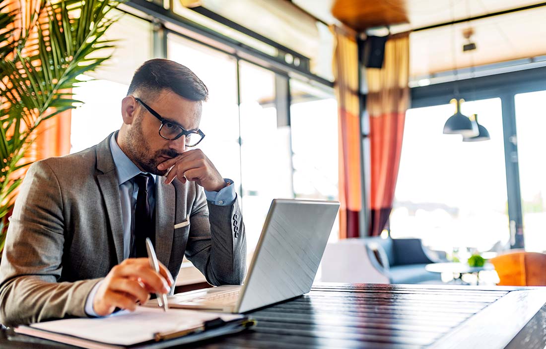 Businessman using a laptop computer.