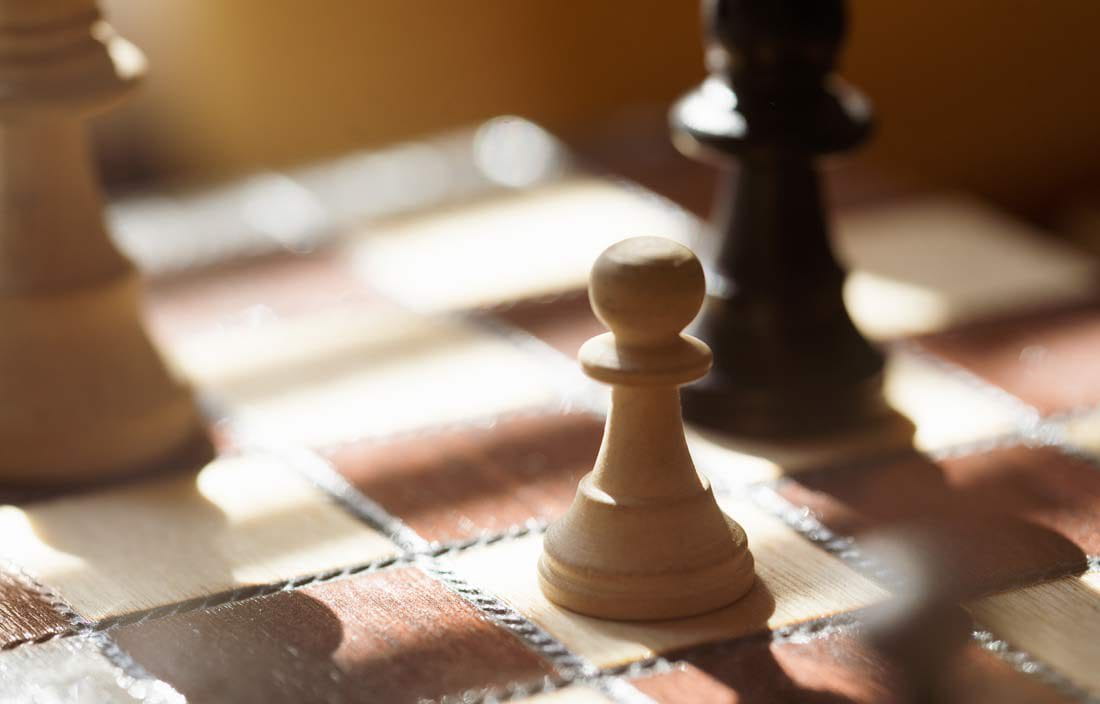 Chess pieces on a chessboard.