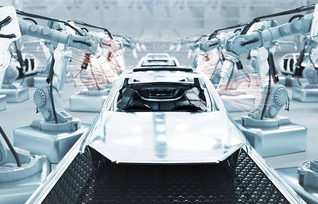Vehicle being worked on in a factory.