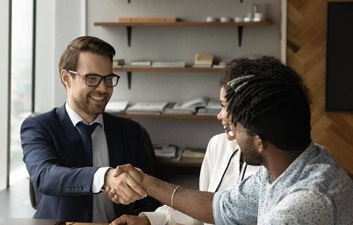 Couple meeting their financial advisor.