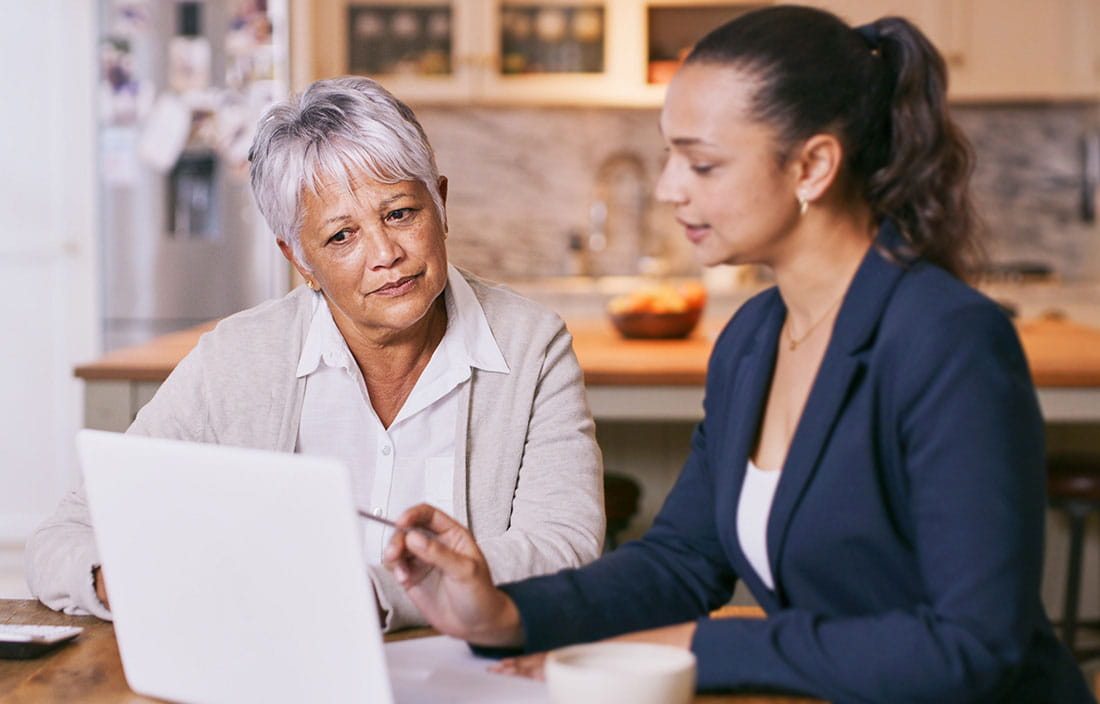 Widow talking with a financial advisor.