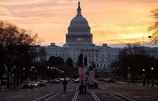 View of U.S. Capitol against the sunset.