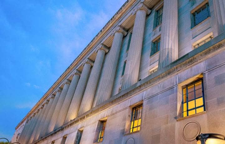 View of a building against a bright sky.