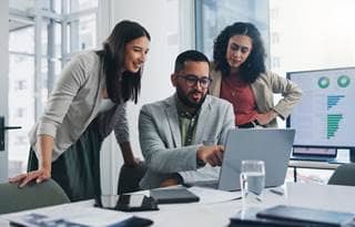 Two professionals discussing uniform guidance with one another