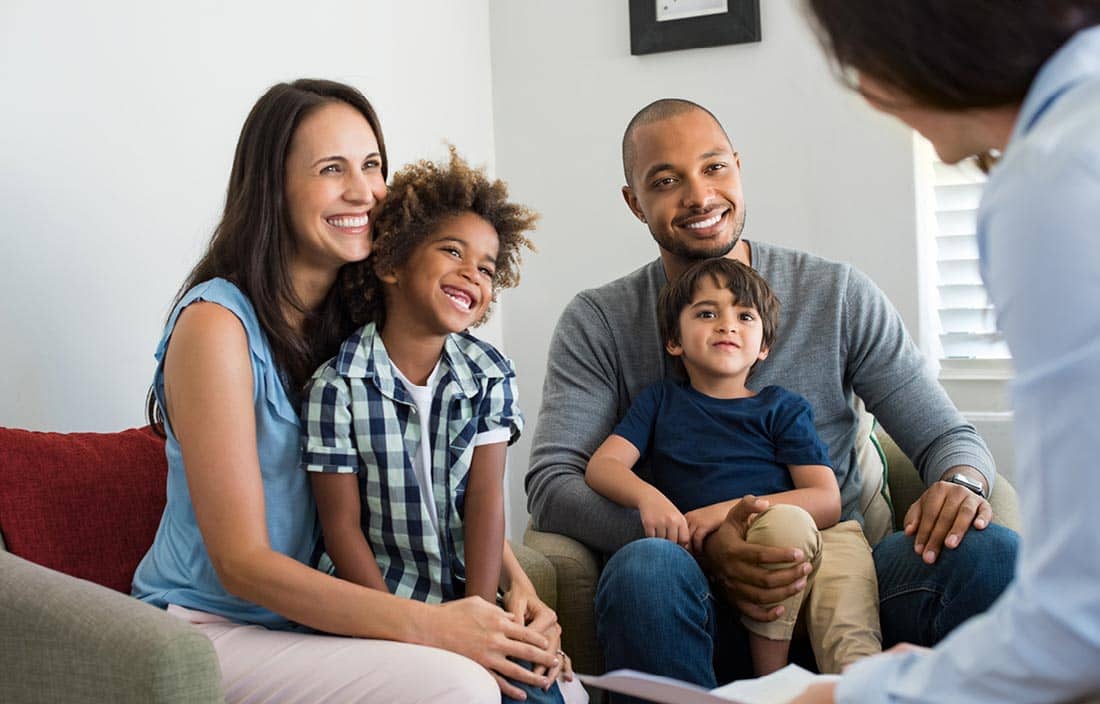 Happy family learning about estate planning.
