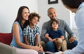 Happy family learning about estate planning.