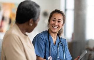 Value based care provider talking to their patient.