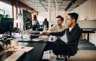 Construction professionals learning about AI at work.