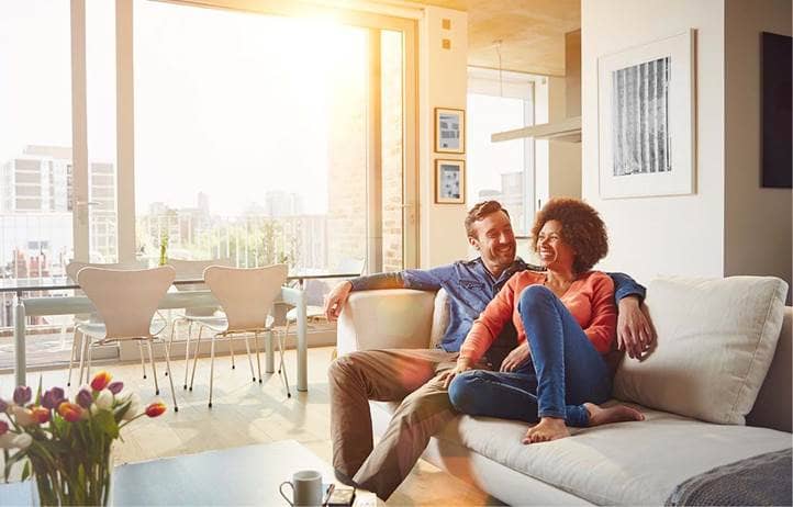 Young couple discussing the FIRE movement and retiring early.