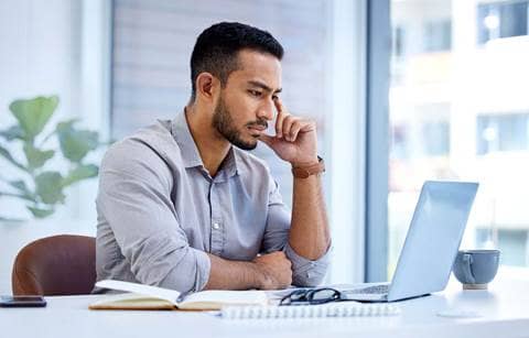 Cybersecurity professional learning about how to improve cyberthreat training.