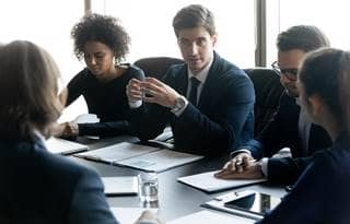 Group of business professional discussing tax changes.