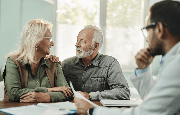 Older couple discussing succession planning with their healthcare provider.