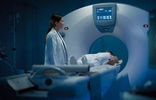 Patient going into an MRI machine.