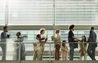 Group of business professionals talking.