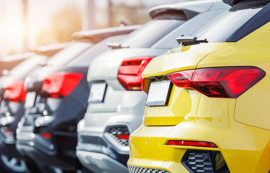 Cars in a parking lot.