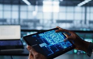 Tablet displaying a digital brain.