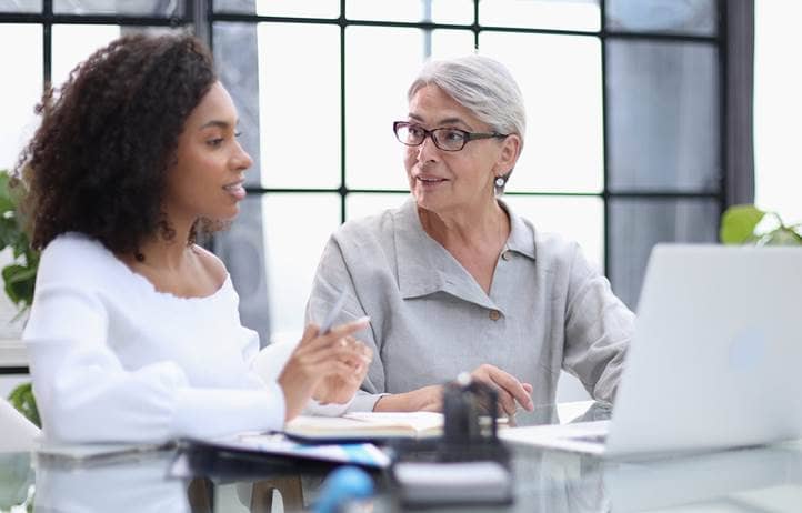 Two public sector professionals discussing Uniform Guidance audit changes.