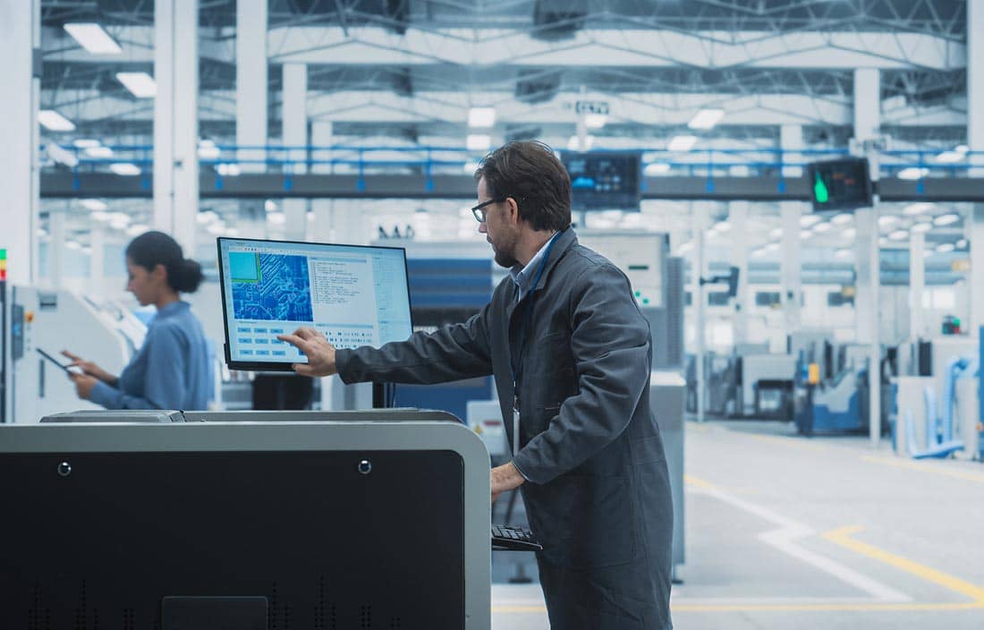 Person working in manufacturing facility.