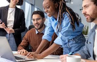 Business professionals working on their laptop.