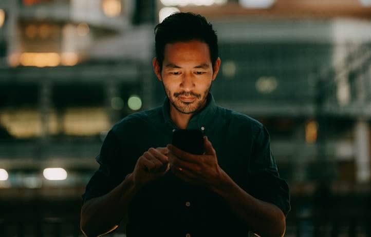 Business professional using their smart phone.