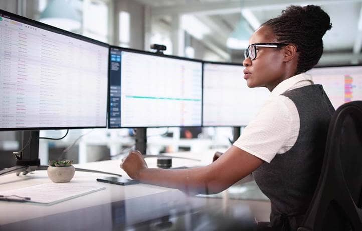 Banking professional working on their computers.