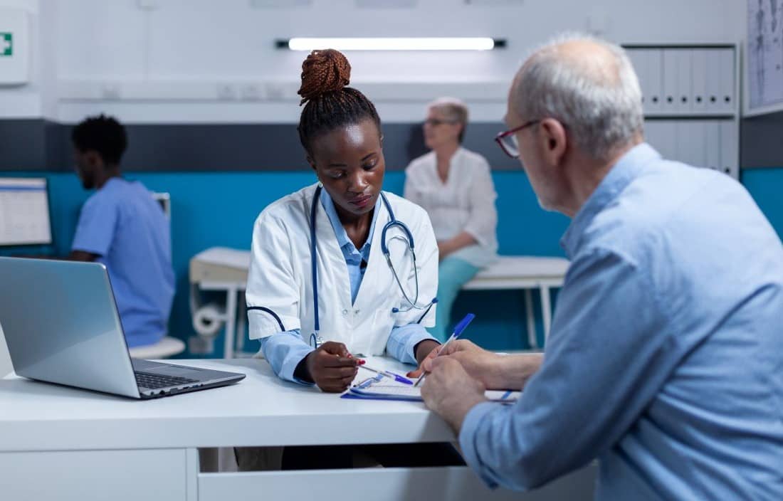 Doctor talking to their patient.