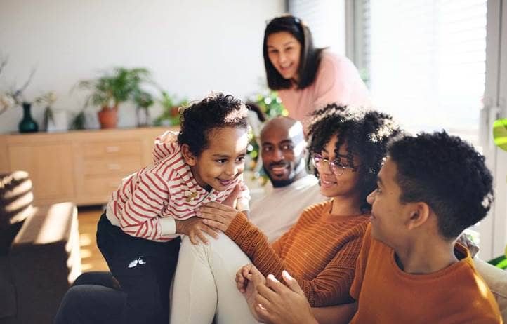 Family spending time together in their living room.