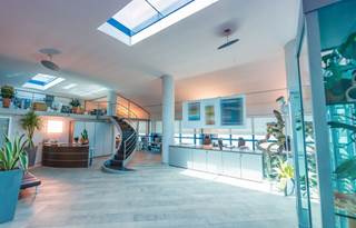 Interior of a modern office lobby and reception area.