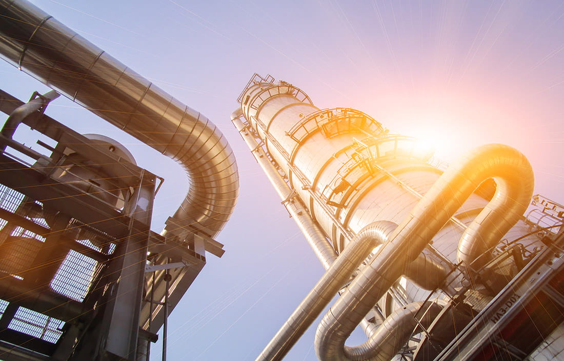 Image of an industrial site with a metal tower.