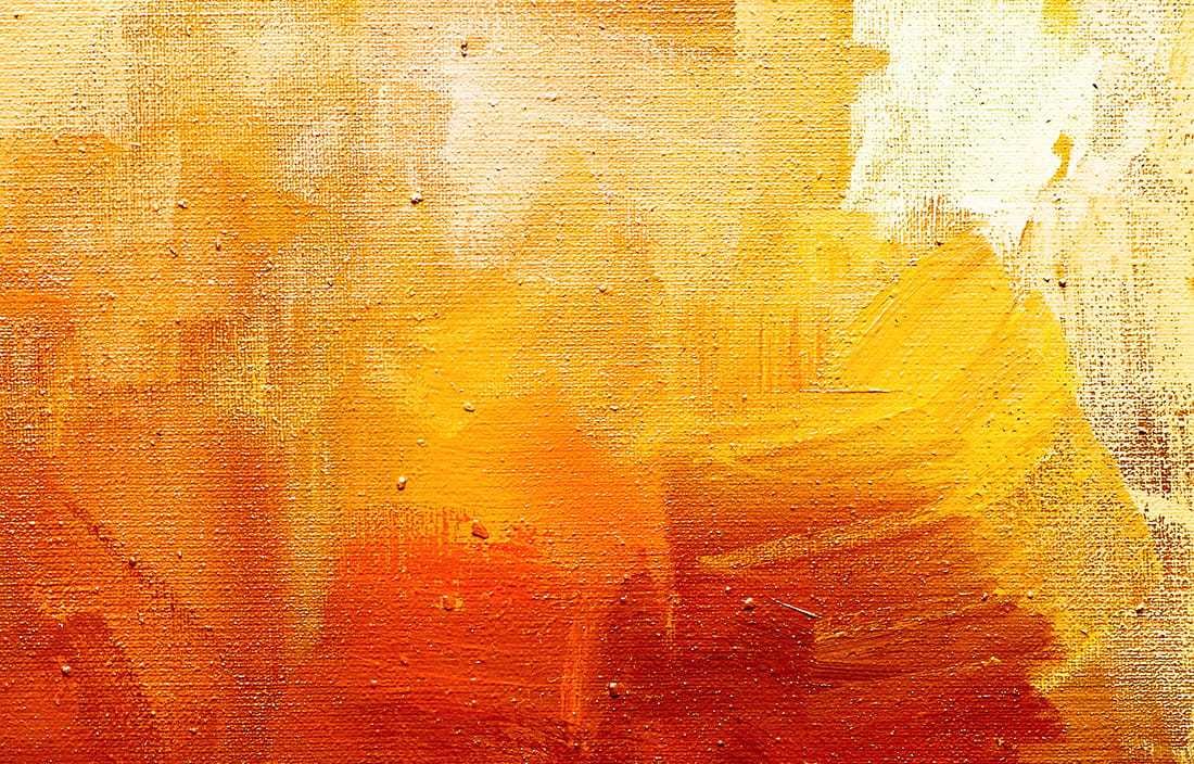Image of orange and yellow paint on canvas