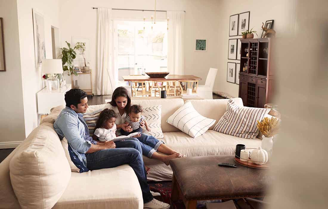 Family sitting on a couch