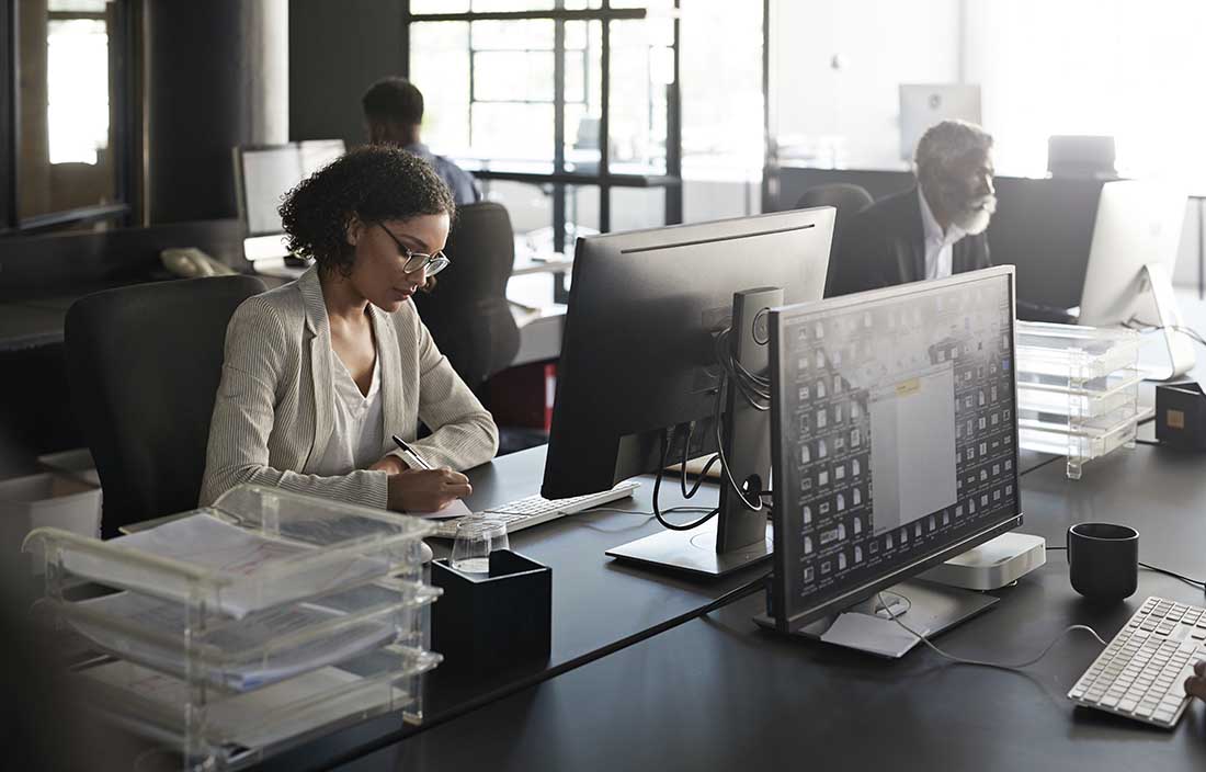 Business professional working at their computer in an office.