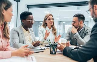 Business professionals in a conference meeting.