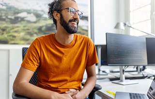 IT professional sitting at their desk.