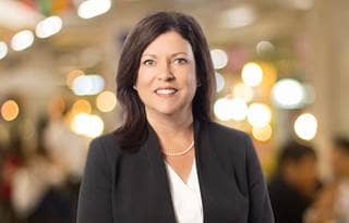Professional photo of Kate Barnes.
