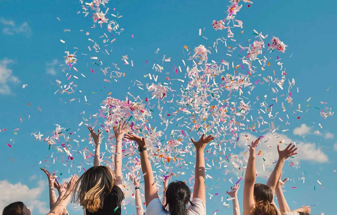 People celebrating with confetti.
