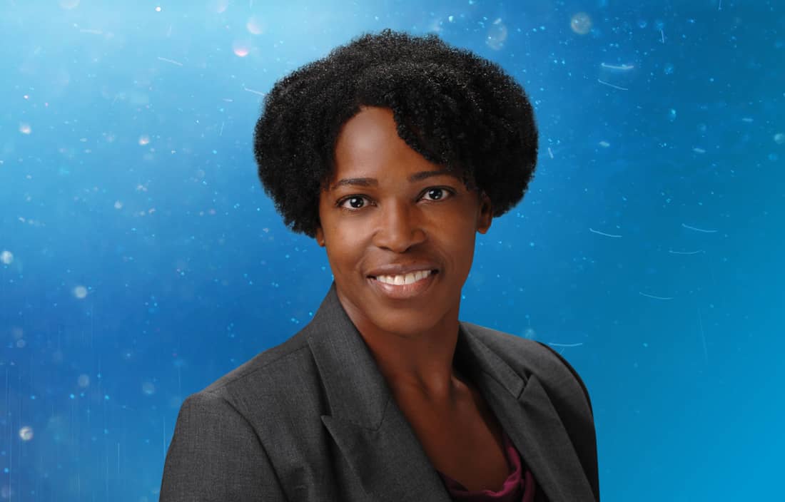Professional photo of Felicia Donaldson in front of a blue gradient background.