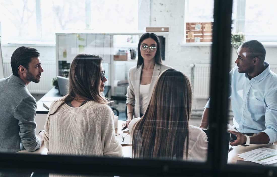 Business professionals in a modern office.