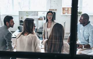 Business professionals in a modern office.