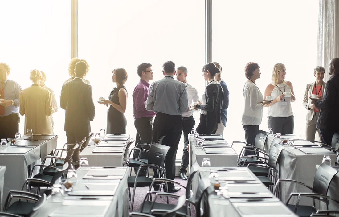 Business meeting people standing by window