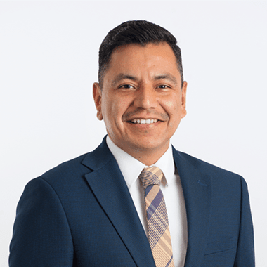 Headshot of Manuel Herrera.