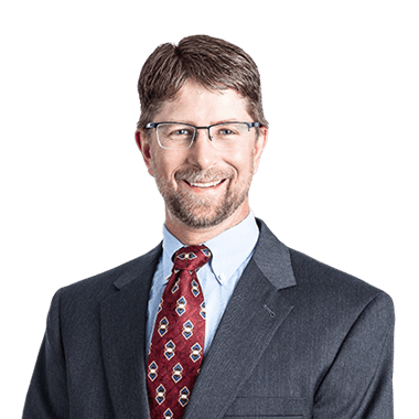 Headshot of Lawrence Knutson