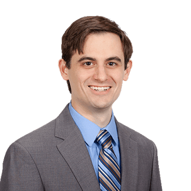 Headshot of Colin Taggart.