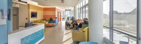 Patients and family waiting in lobby of DMC Children's Hospital of Michigan.