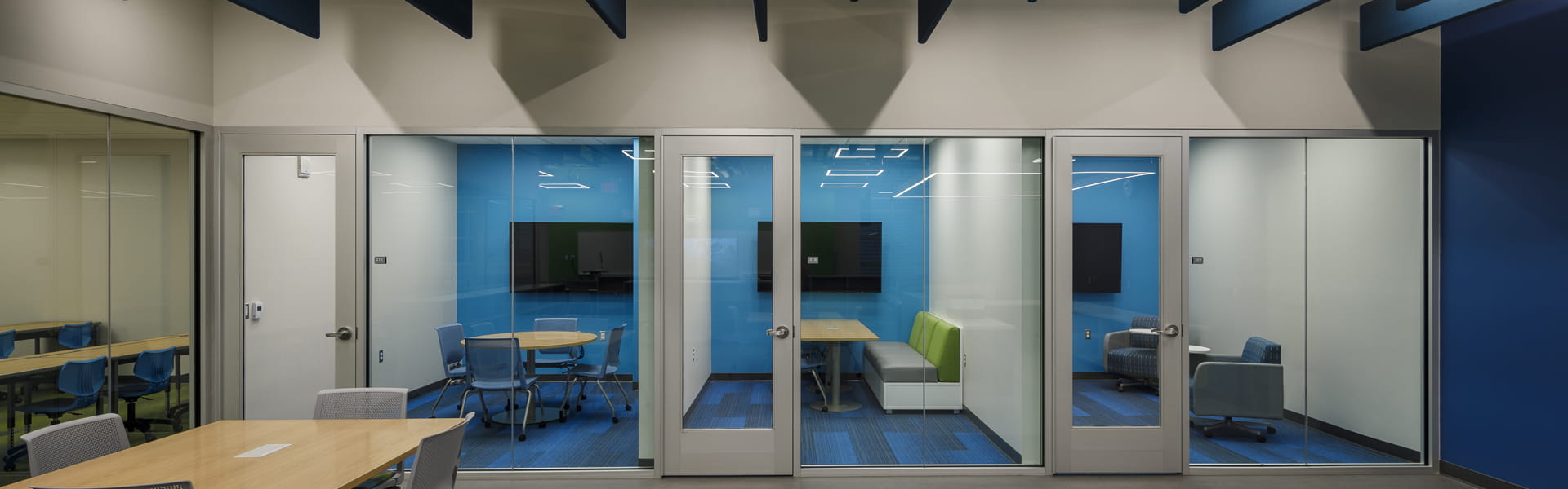 View of Southwest Middle High interior meetings rooms with glass walls.