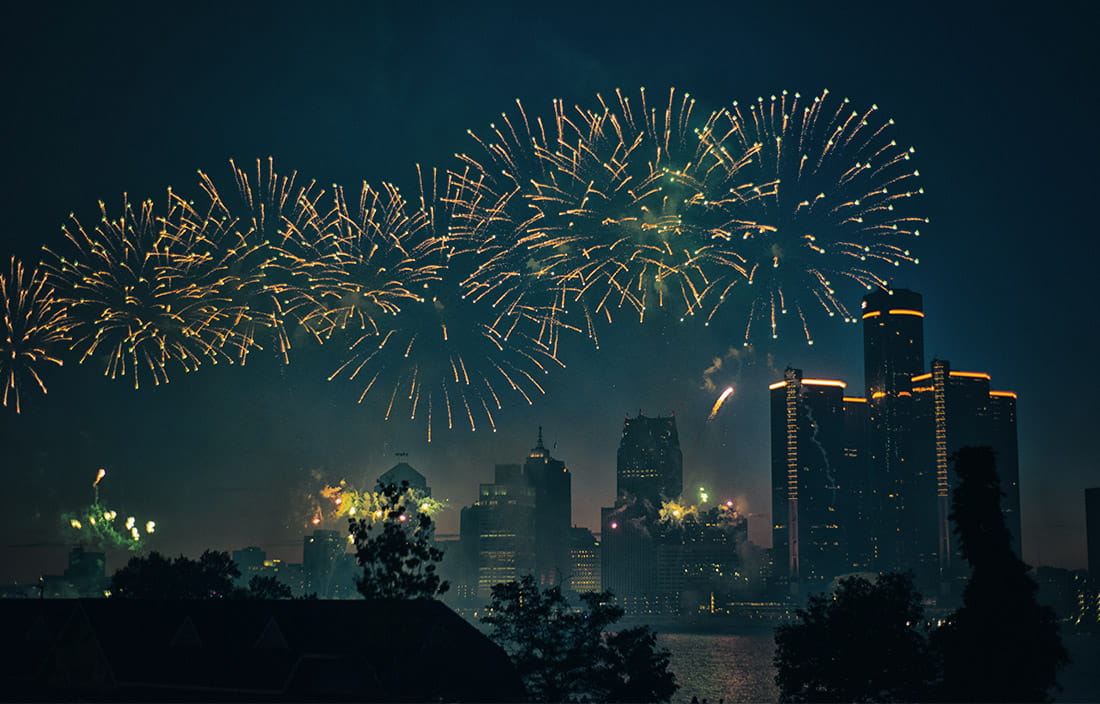 Fireworks above a city skyline